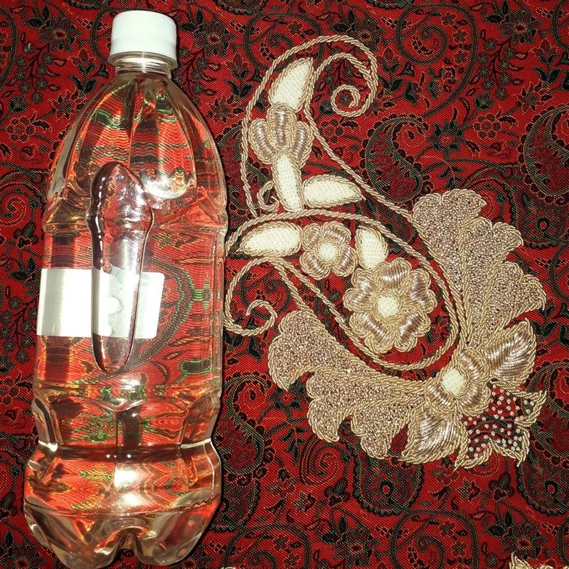 عرق بهارنارنج گیلان بسیارسنگین یک لیتری گیلان.رشت