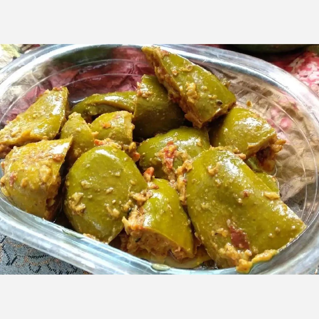 ترشی انبه بوشهری(تند،ساده)،1000گرمی،باهسته،گیلان.رشت